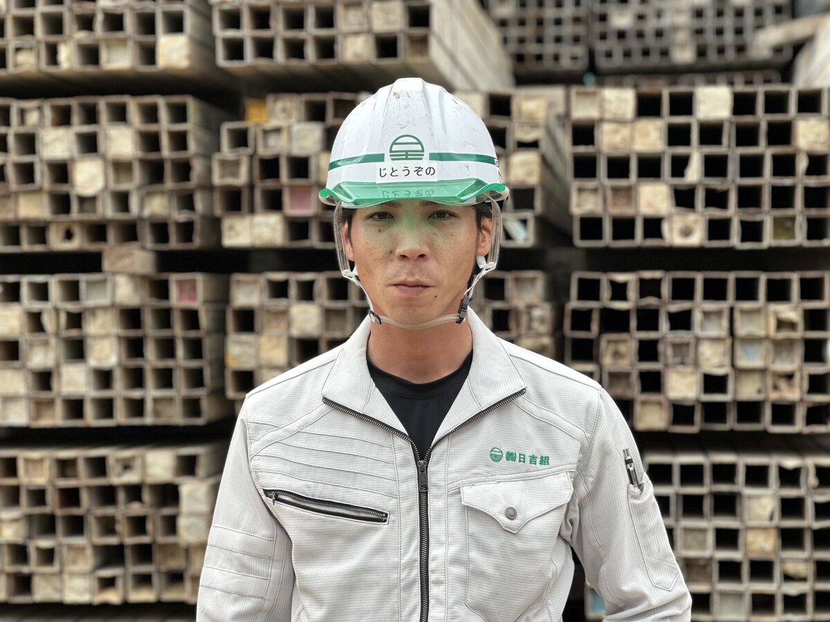 日吉組の作業着を着た職人